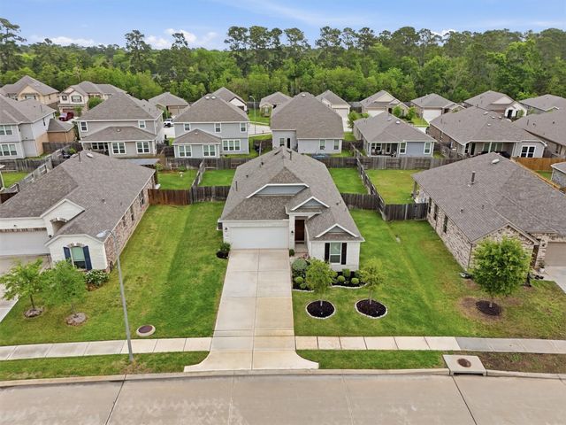 8739 Ute Creek Lane, Magnolia, TX 77354