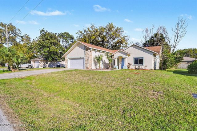 10 PATCHOGUE Lane, Palm Coast, FL 32164