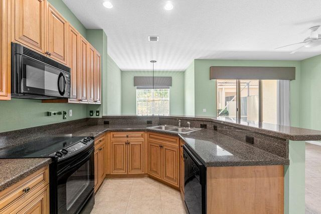 526 COMMONS Drive, Palm Beach Gardens, FL 33418