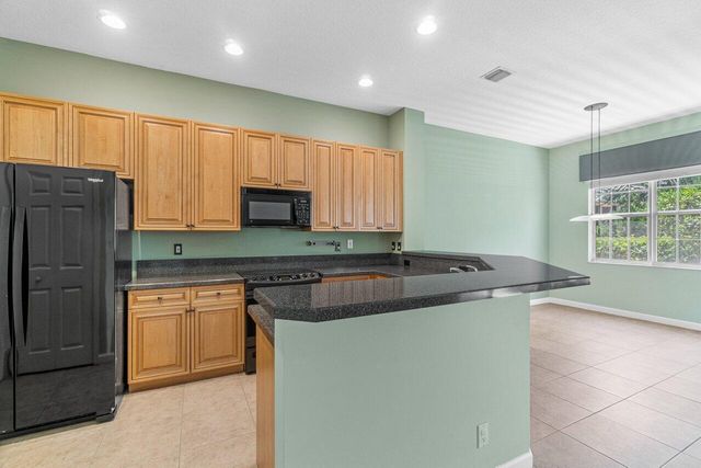 526 COMMONS Drive, Palm Beach Gardens, FL 33418