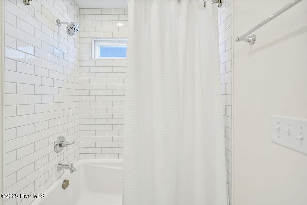 Image 13 of property listing at 1408 E Beach Drive, Oak Island, NC 28465