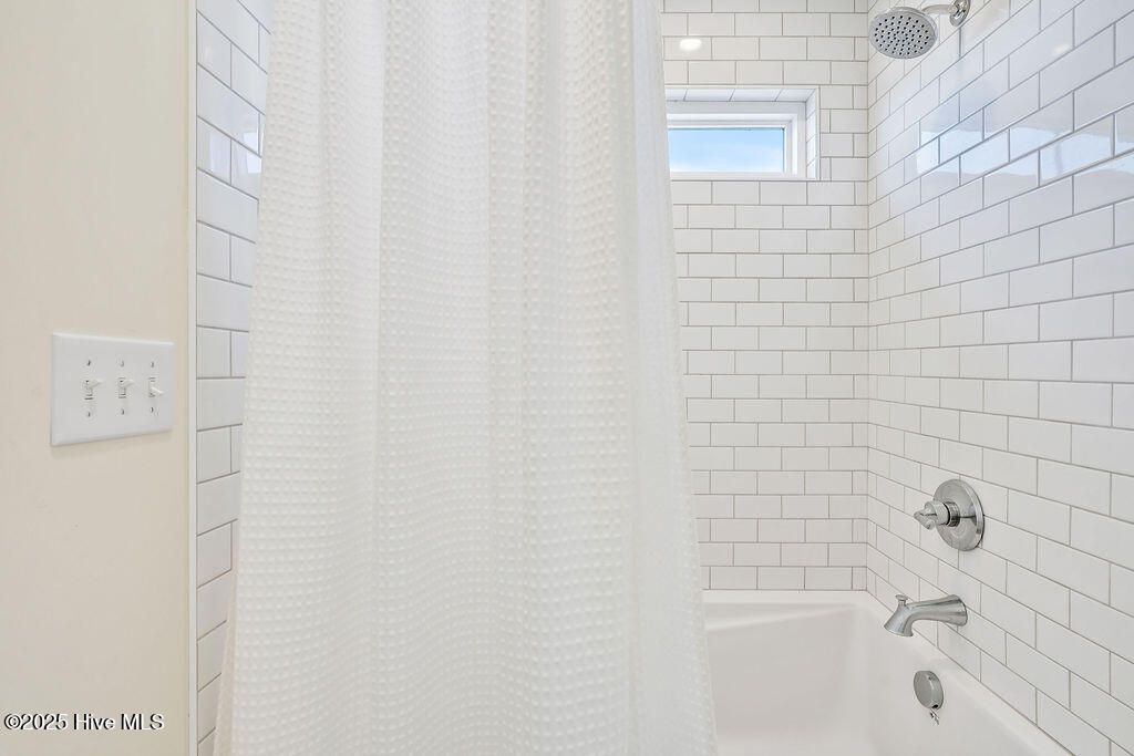 Image 19 of property listing at 1408 E Beach Drive, Oak Island, NC 28465