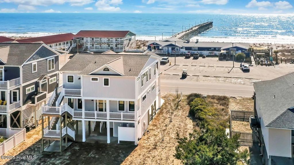 Image 3 of property listing at 1408 E Beach Drive, Oak Island, NC 28465
