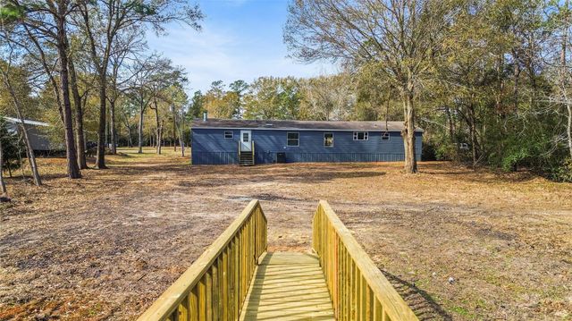 11759 W Hollyhill Drive, Plantersville, TX 77363