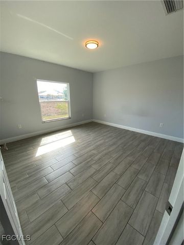 2213 Hogan DR, Lehigh Acres, FL 33973