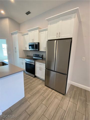 2213 Hogan DR, Lehigh Acres, FL 33973