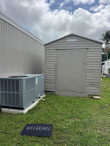 182 Plantation Boulevard, Greenacres, FL 33467