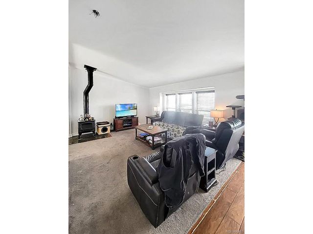 58117 E 42nd Dr, Strasburg, CO 80136