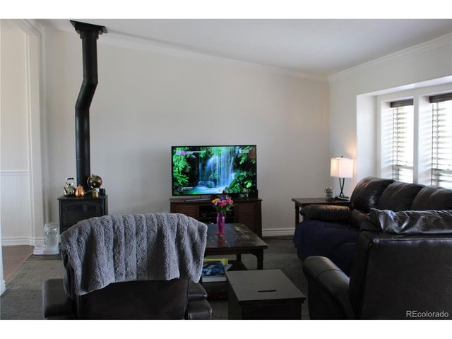 58117 E 42nd Dr, Strasburg, CO 80136