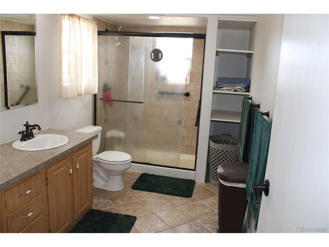 58117 E 42nd Dr, Strasburg, CO 80136