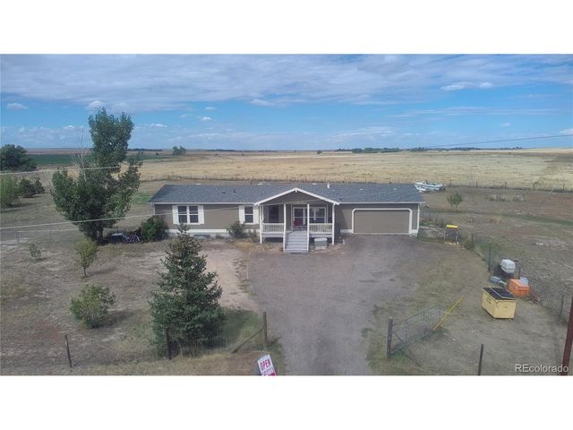 58117 E 42nd Dr, Strasburg, CO 80136