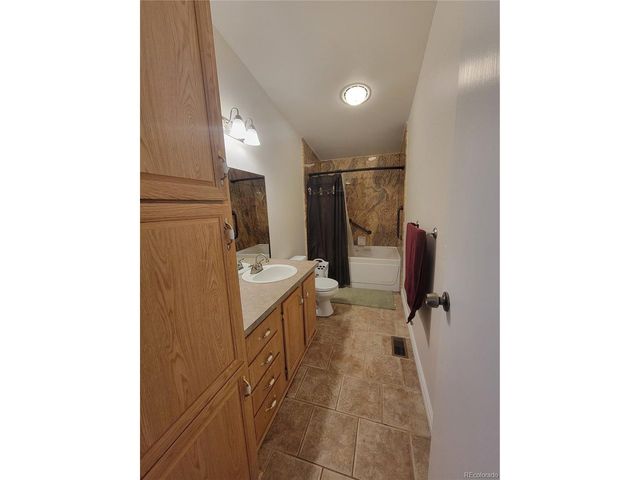 58117 E 42nd Dr, Strasburg, CO 80136