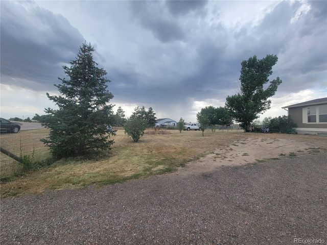 58117 E 42nd Dr, Strasburg, CO 80136