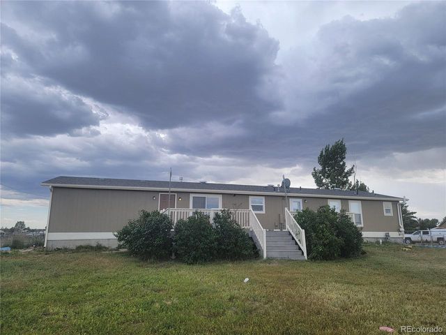 58117 E 42nd Dr, Strasburg, CO 80136
