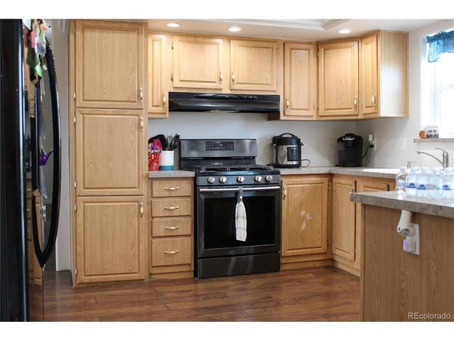 58117 E 42nd Dr, Strasburg, CO 80136