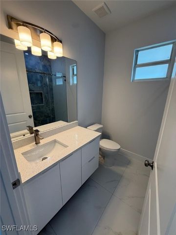 852 Amigo ST E, Lehigh Acres, FL 33974