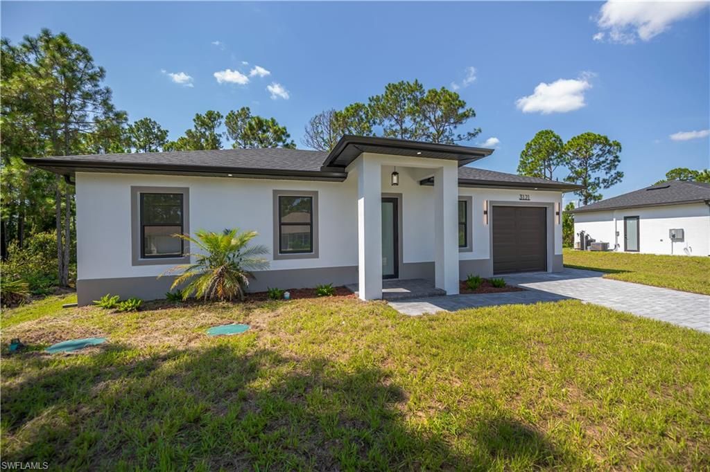 3121 69th ST W, LEHIGH ACRES, FL 33971 — photo 2