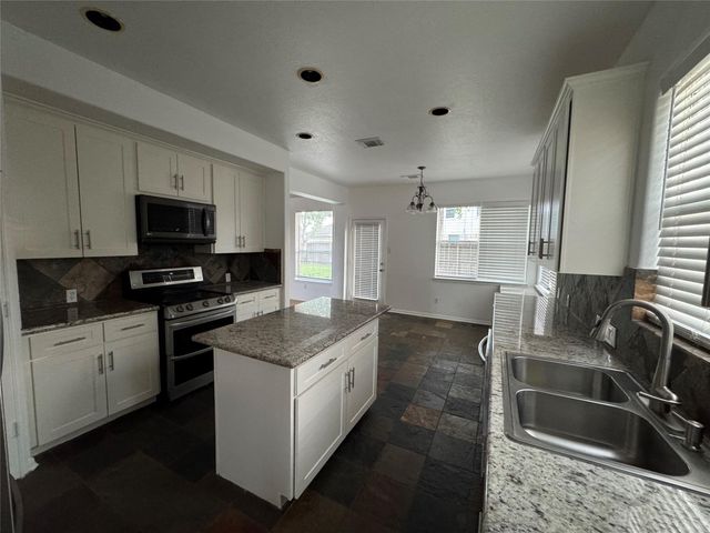 6311 Auburn Terrace Court, Spring, TX 77389