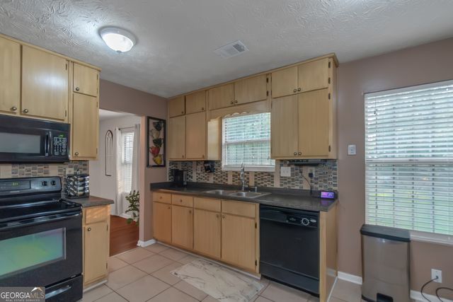 3823 Rock Hollow Court, Conley, GA 30288