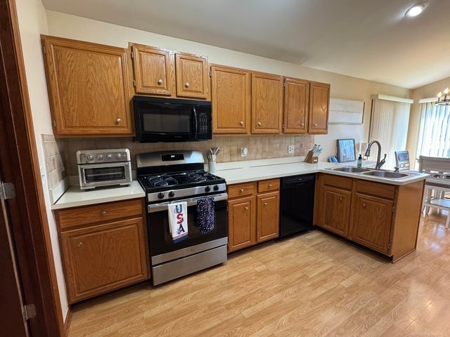 41201 Whispering Oaks Drive, Clinton Township, MI 48038