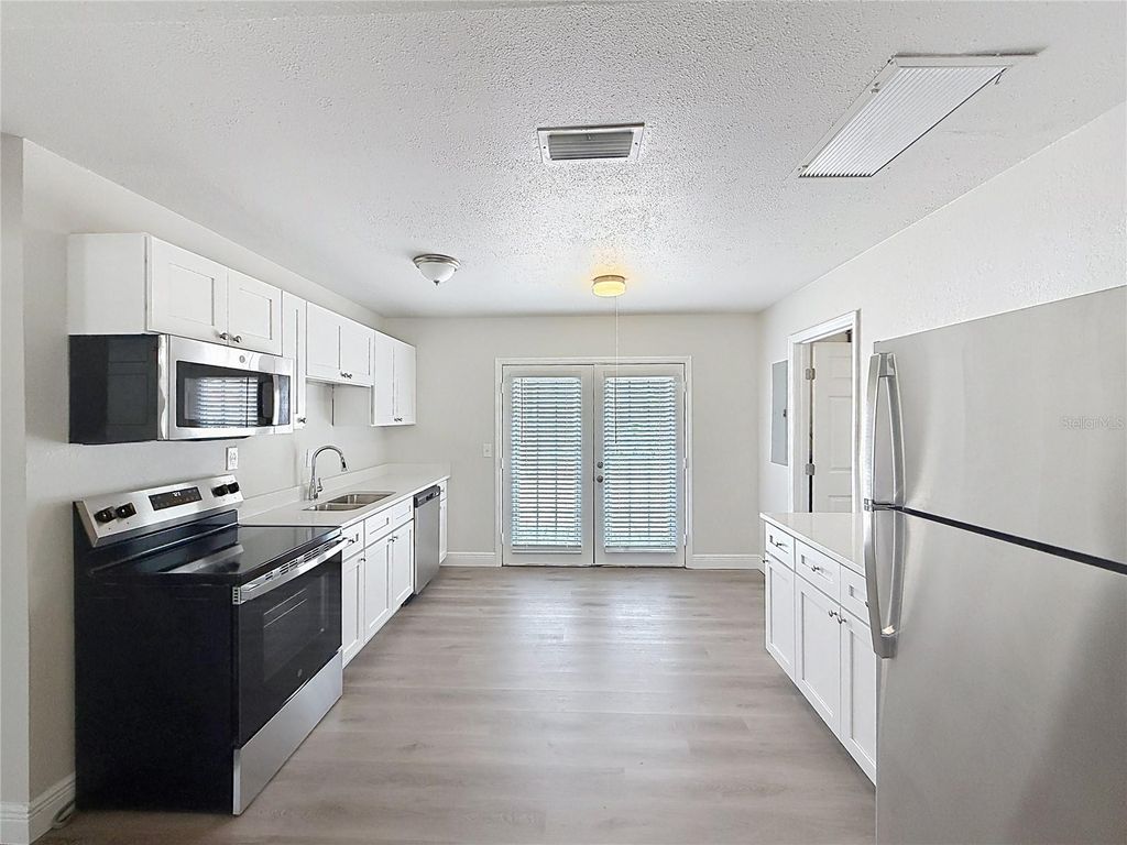 Image 3 of property listing at 7503 W NEW ORLEANS AVENUE, Tampa, FL 33615