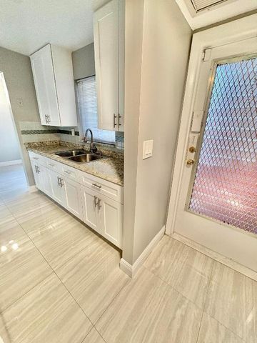 26 Golfs Edge A, West Palm Beach, FL 33417