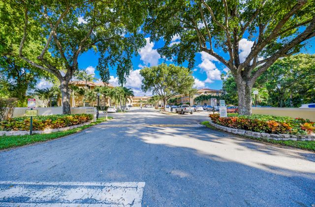 11477 NW 39th Court 306-1, Coral Springs, FL 33065