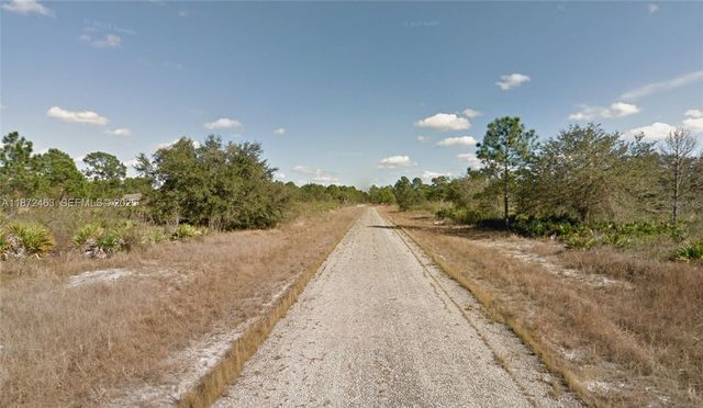 1132 RANDAN STREET E, Lehigh Acres, FL 33974