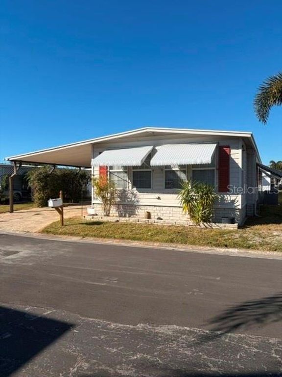 Image 1 of property listing at 10461 PEACEFUL DRIVE, Largo, FL 33773