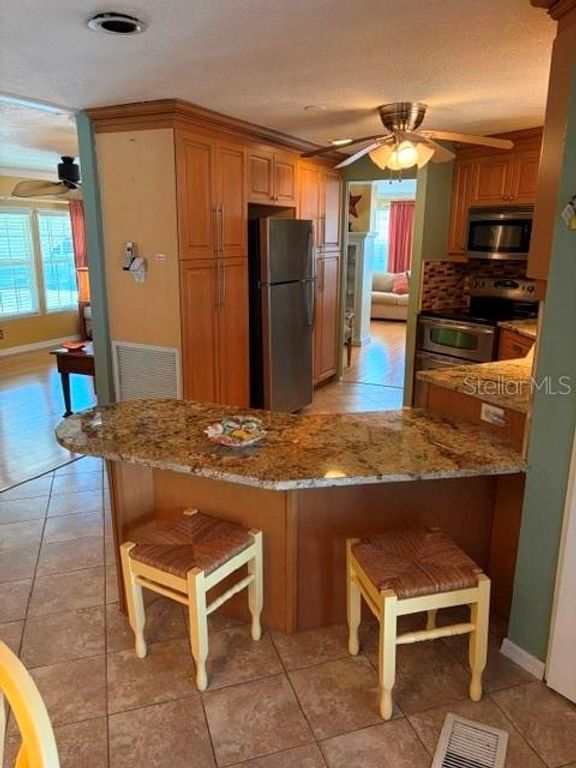 Image 9 of property listing at 10461 PEACEFUL DRIVE, Largo, FL 33773