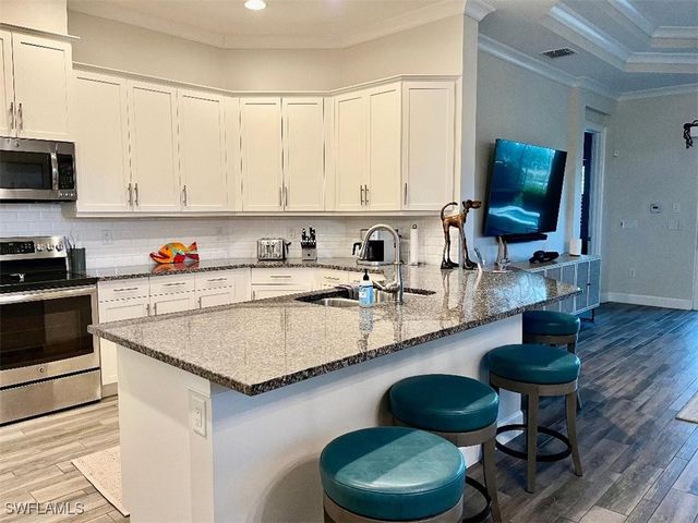 6907 Cay CT, Naples, FL 34113