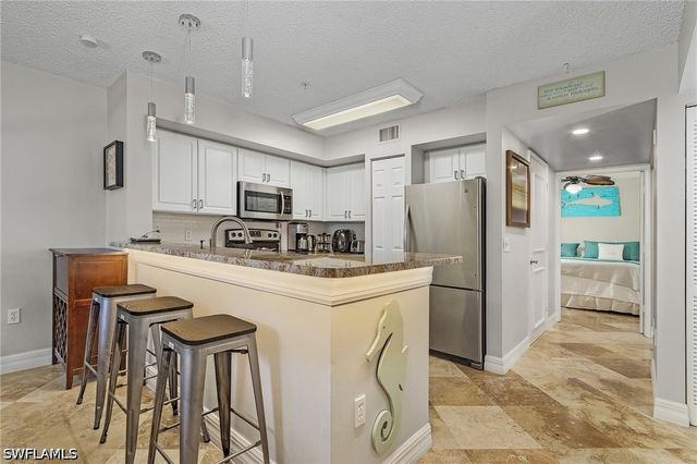 1180 Wildwood Lakes BLVD 208, Naples, FL 34104