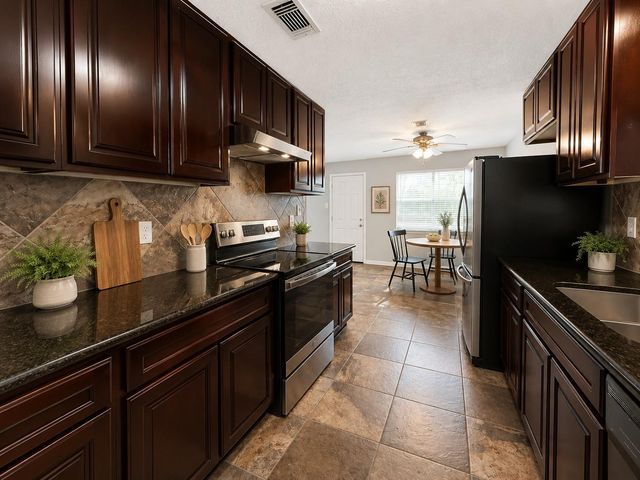 12027 Silver Island Circle, Houston, TX 77067