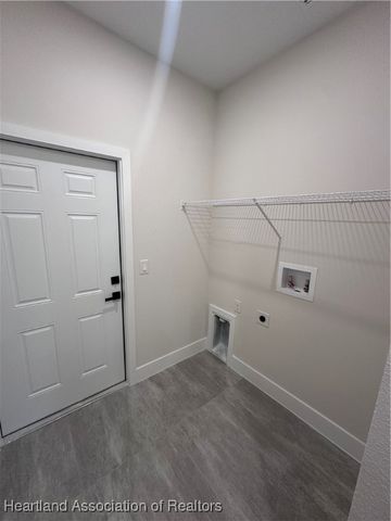 703 Aston-Martin Drive, Sebring, FL 33782