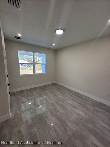 703 Aston-Martin Drive, Sebring, FL 33782