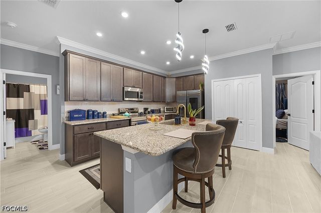 605 Norman AVE, Lehigh Acres, FL 33971