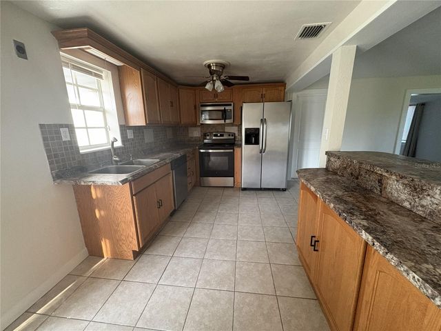 107 W GOLF LINKS AVENUE, Eustis, FL 32726