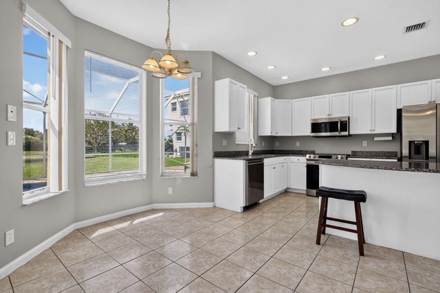 9855 Woolworth Court Court, Wellington, FL 33414