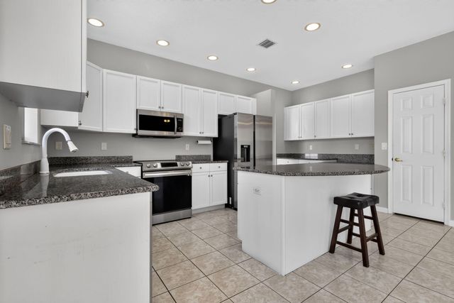 9855 Woolworth Court Court, Wellington, FL 33414