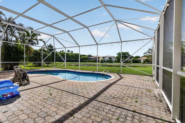 9855 Woolworth Court Court, Wellington, FL 33414