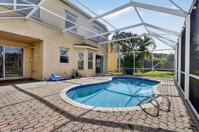 9855 Woolworth Court Court, Wellington, FL 33414