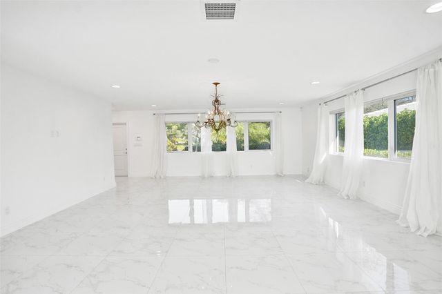 26 Cayuga Road, Sea Ranch Lakes, FL 33308