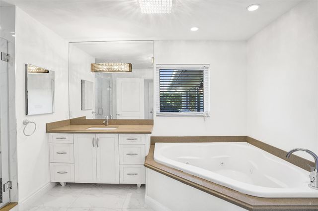 26 Cayuga Road, Sea Ranch Lakes, FL 33308