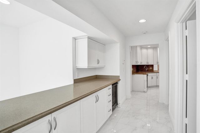 26 Cayuga Road, Sea Ranch Lakes, FL 33308