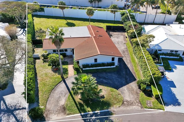 26 Cayuga Road, Sea Ranch Lakes, FL 33308