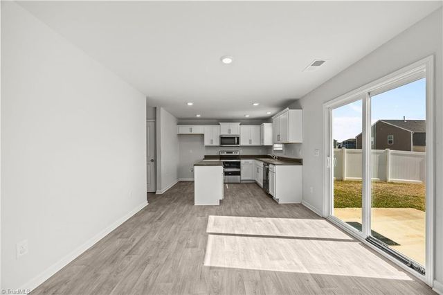 6884 Keeneland Drive, Whitsett, NC 27377