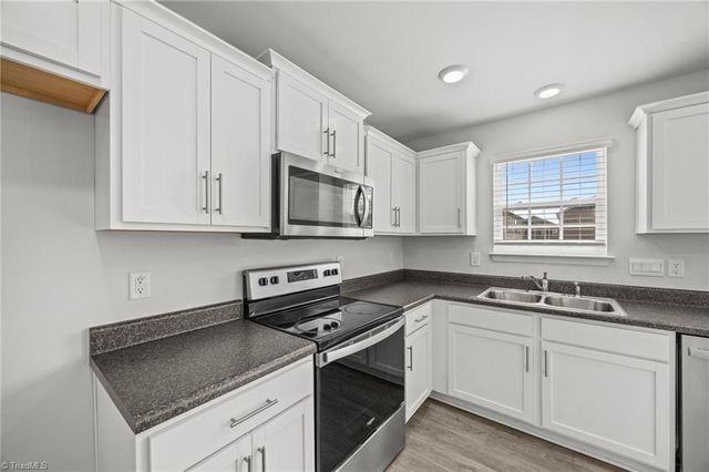 6884 Keeneland Drive, Whitsett, NC 27377