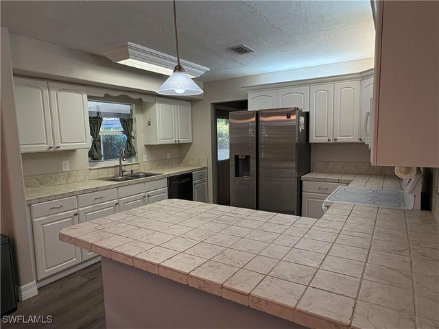 203 Esther ST, Naples, FL 34104