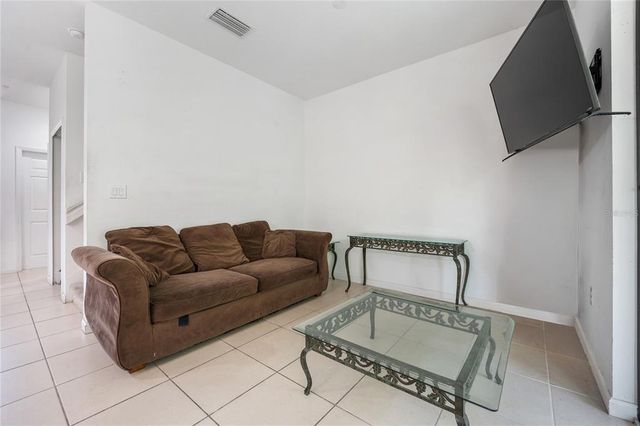 1833 PORTOFINO MEADOWS BOULEVARD, Orlando, FL 32824