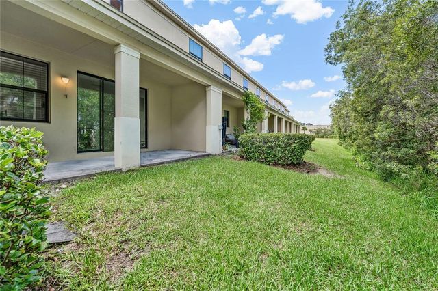 1833 PORTOFINO MEADOWS BOULEVARD, Orlando, FL 32824